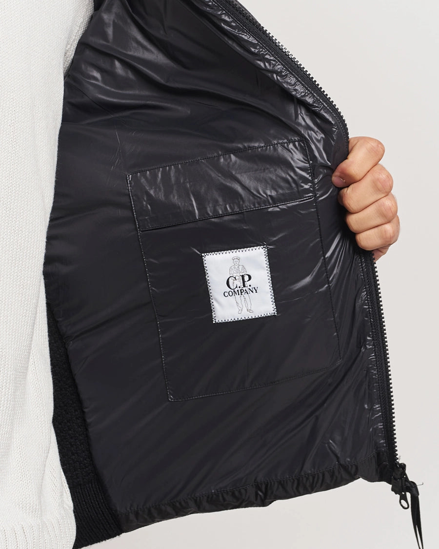 CP. COMPANY
Merino Wool Padded Hybrid Hood Jacket Black